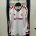 Maglia retro a maniche lunghe di trasferta bianca di Manchester United nel 1986