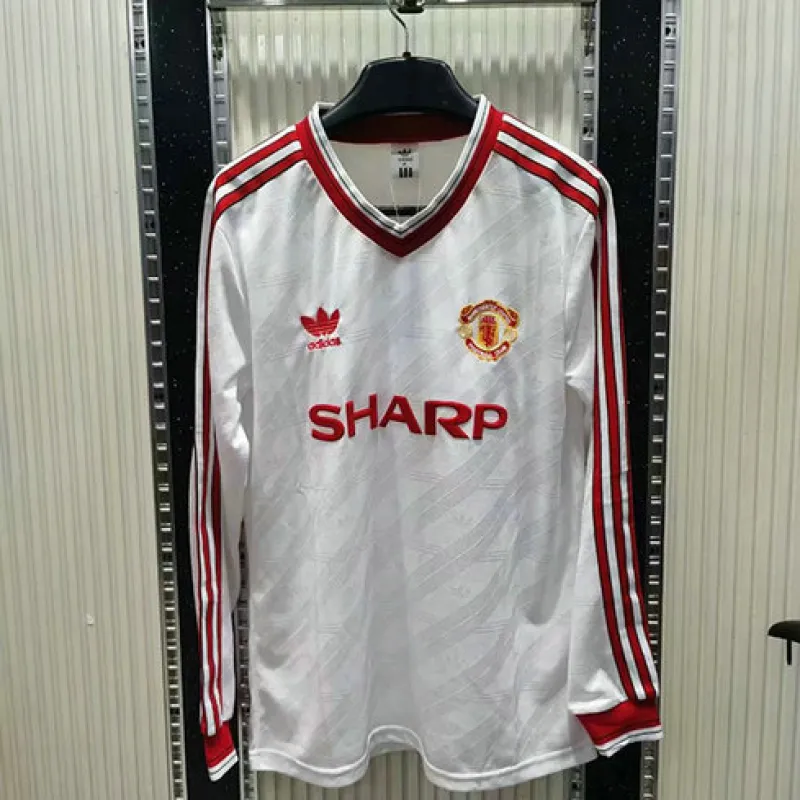 Maglia retro a maniche lunghe di trasferta bianca di Manchester United nel 1986