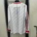 Maglia retro a maniche lunghe di trasferta bianca di Manchester United nel 1986