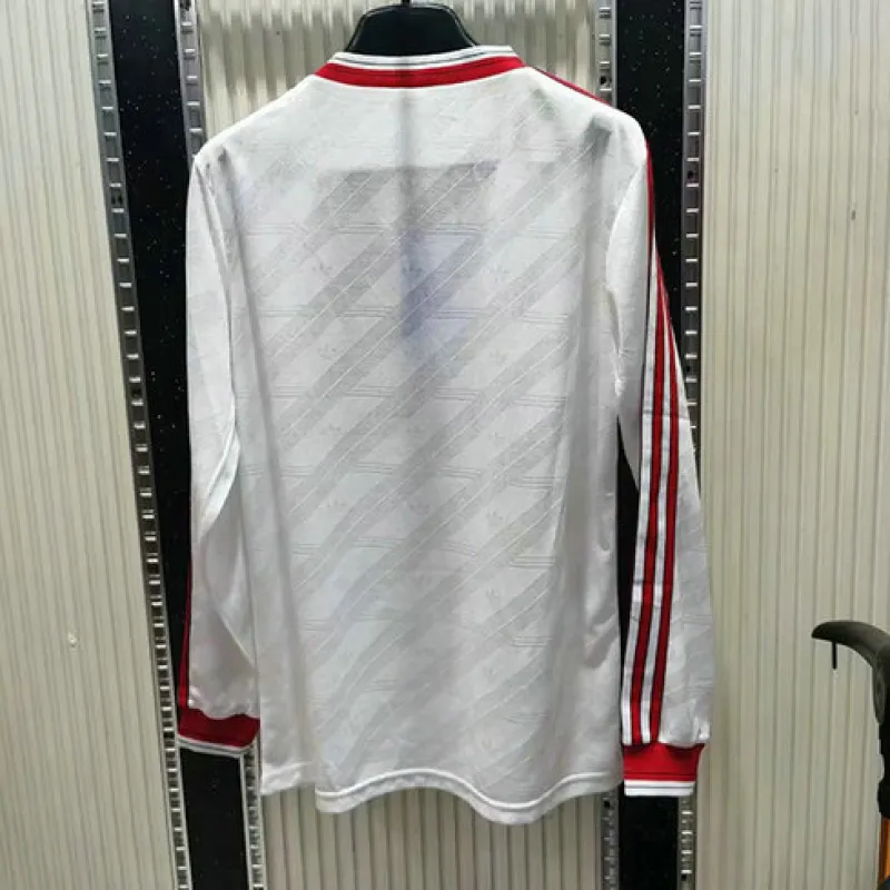 Maglia retro a maniche lunghe di trasferta bianca di Manchester United nel 1986