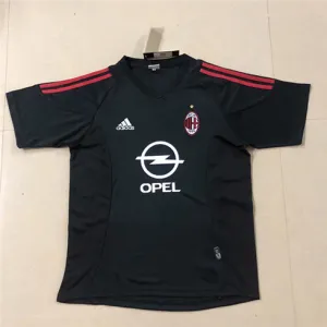 Maglia retro di trasferta della Champions League UEFA 2002/03 dell'AC Milan - Nera